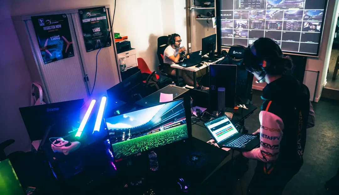 The EreaStudio team backstage, running an event from a wall of screens